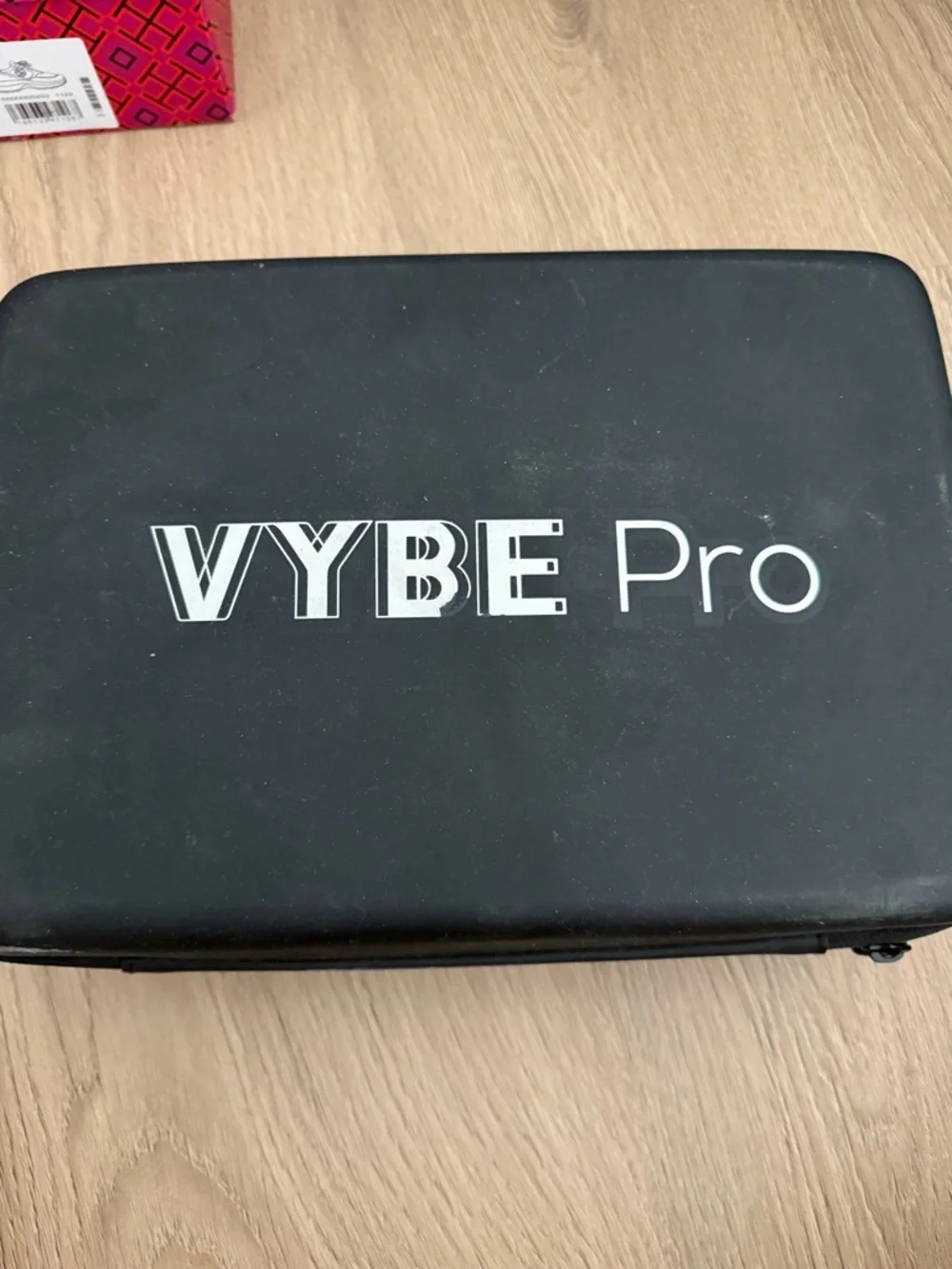 The VYBE Pro Percussion Massage Gun is a high-performance handheld device
